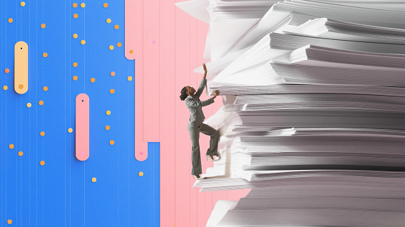 A person in a gray suit is climbing a large stack of white papers, reaching upward as if trying to overcome an overwhelming amount of paperwork. The background features a split design with vibrant blue and pink colors, adorned with yellow dots and abstract shapes, creating a modern and dynamic feel.
