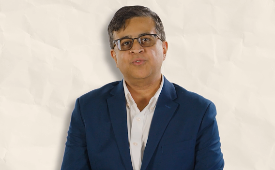 Dhruv Maniktala wearing blue suit with white shirt